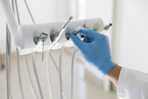 Professional Dental Implants technician working in Maquoketa, IA
